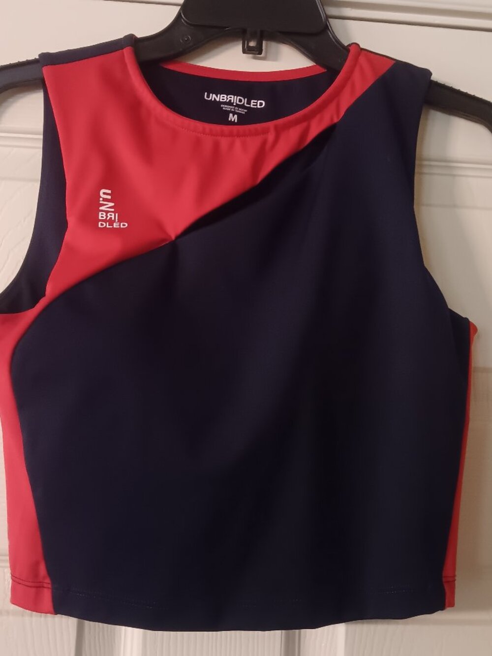 Unbridled by Tail M top